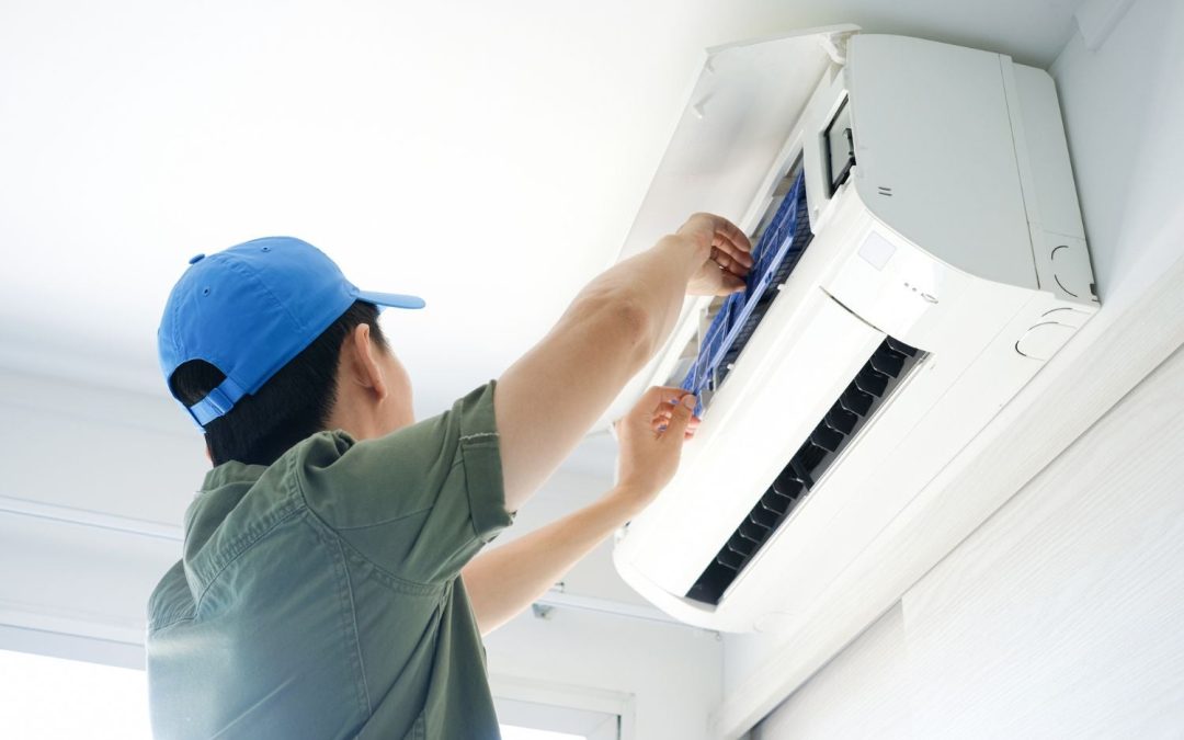 HVAC technician servicing a ductless mini split in Stevenson Ranch