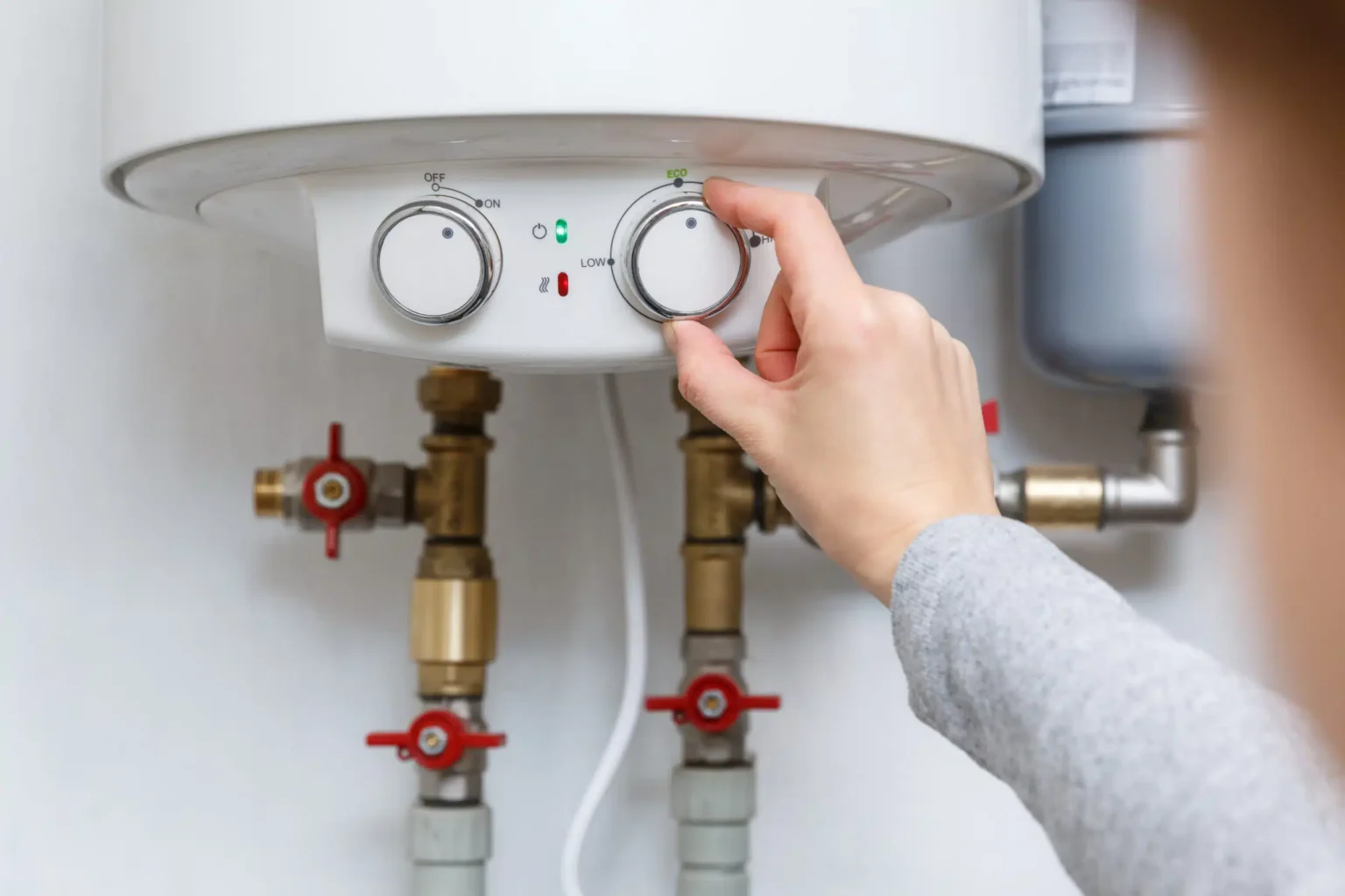 Technician adjusting a water heater in Stevenson Ranch